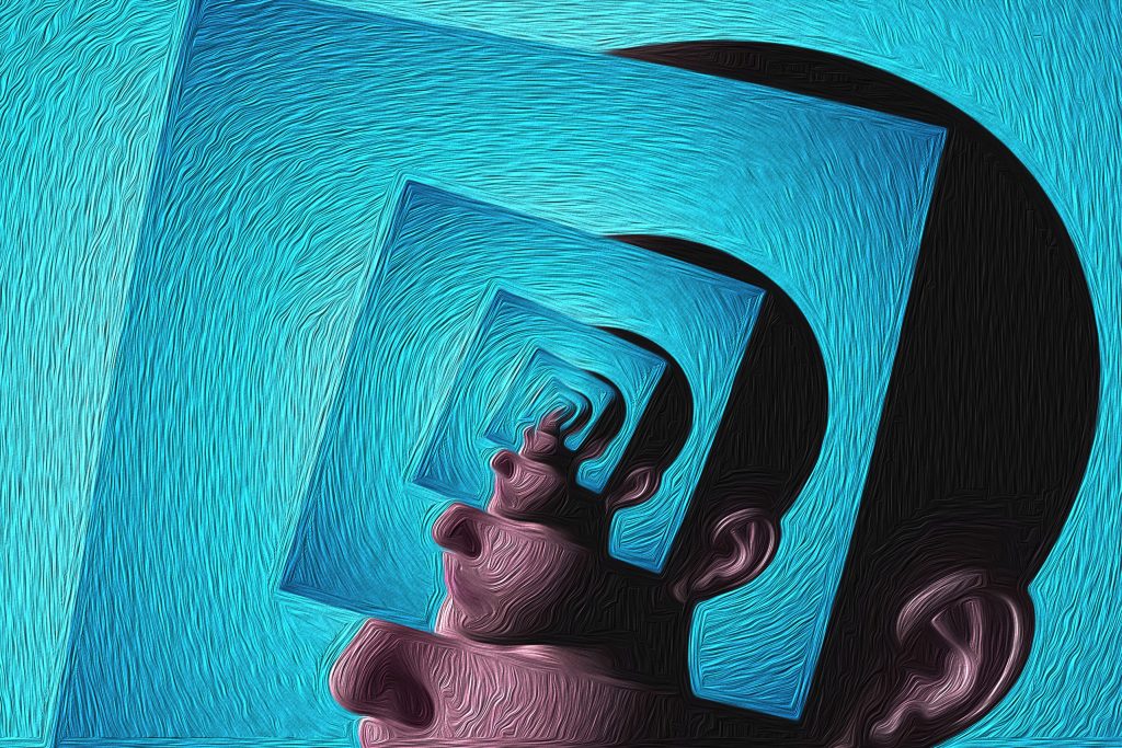 Image of a persons head with the same image within and the same image within that showing nested layers of the same image representing the layers of the conscious, subconscious and unconscious